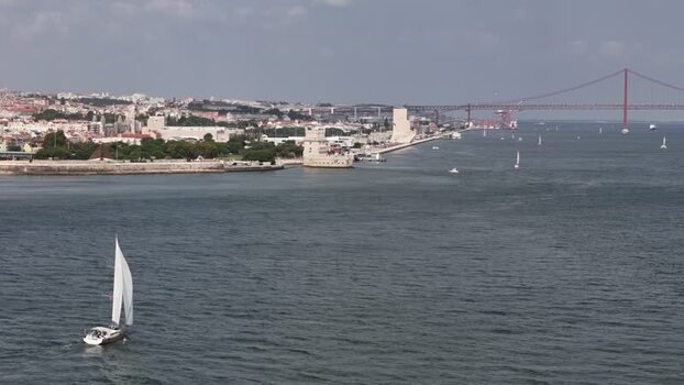 Aerial view of a sailboat on the Tagus River Portugal.