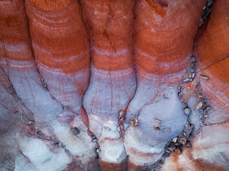 Aerial view of the colorful layered sediment and eroded rock formations of the badlands in Hanksville Utah United States.