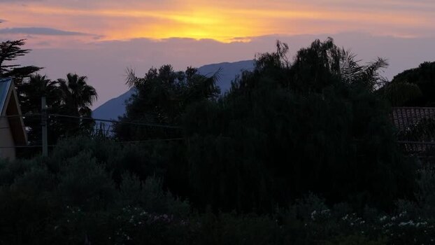 Aerial view of sunset over the landscape of Terrasini Italy.