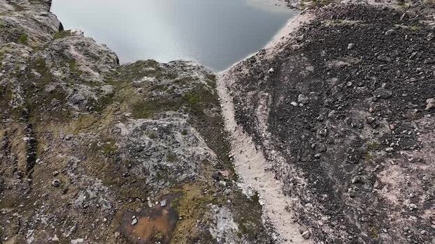 FPV aerial view of rocky terrain in Uummannaq Greenland. FPV aerial view of rocky terrain in Uummannaq Greenland.