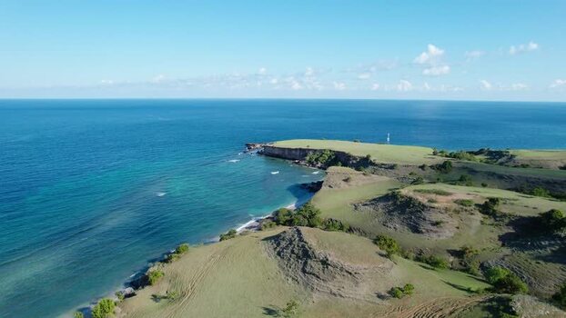 Aerial view of Mausui Savanna and the coastline Indonesia. Aerial view of Mausui Savanna and the coastline Indonesia.