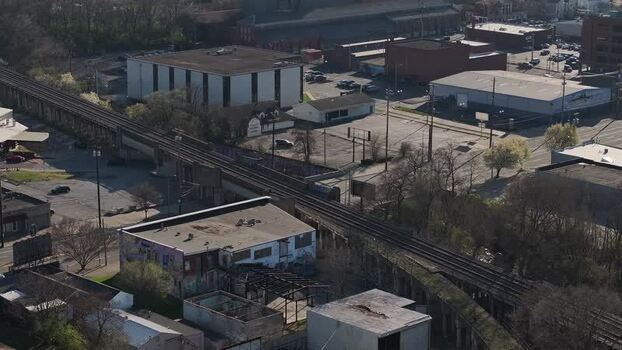 Aerial view of an elevated railway and industrial area United States. Aerial view of an elevated railway and industrial area United States.