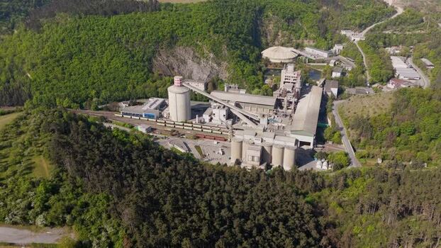 Aerial view of an industrial cement plant with silos Czechia. Aerial view of an industrial cement plant with silos Czechia.
