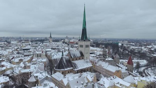 Aerial view of St. Olaf s Church in snowy Tallinn Estonia.