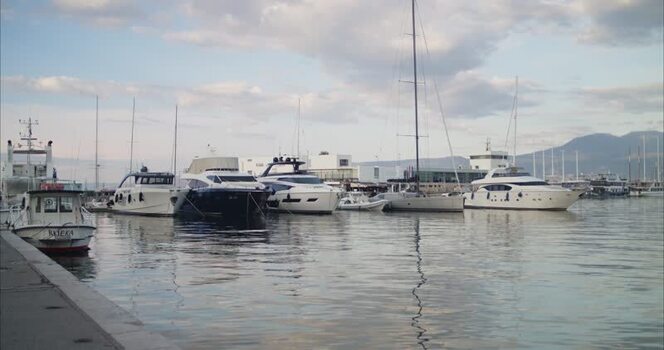 View of yachts docked at the harbor in Rijeka Croatia. View of yachts docked at the harbor in Rijeka Croatia.