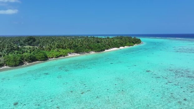 Aerial view of the tropical coastline and turquoise waters Maldives Aerial view of the tropical coastline and turquoise waters Maldives