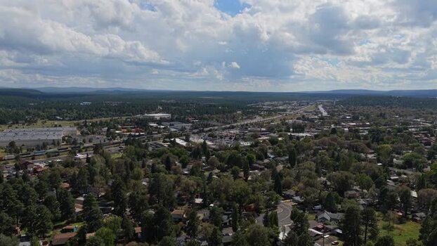 Aerial view of Flagstaff with a train moving through United States. Aerial view of Flagstaff with a train moving through United States.