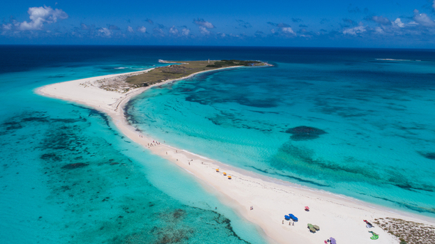 Aerial view of Los Roques archipelago with its white sand beaches turquoise Caribbean waters and coral reefs in Los Roques Dependencias Federales Venezuela. Aerial view of Los Roques archipelago with its white sand beaches turquoise Caribbean waters and coral reefs in Los Roques Dependencias Federales Venezuela.