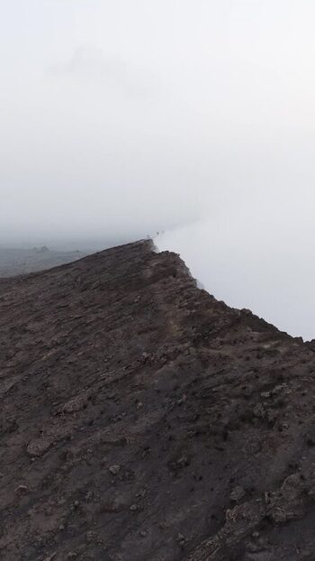 Aerial view of Erta Ale Volcano ridge with smoke Ethiopia. Aerial view of Erta Ale Volcano ridge with smoke Ethiopia.