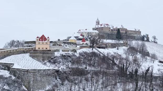 Aerial view of Riegersburg Castle on a snowy hill Austria.