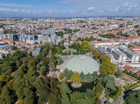Aerial view of Jardins do Palacio de Cristal with its iconic domed pavilion lush gardens and surrounding urban landscape of Porto Porto Portugal.