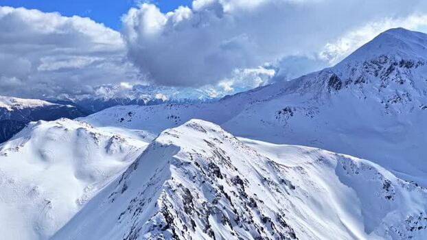 Aerial view of snow covered mountain peaks in Nauders Austria.