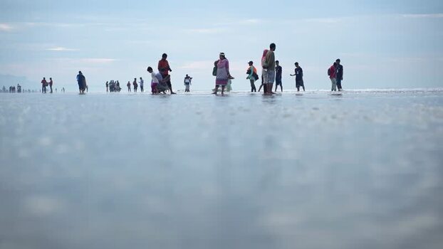 View of people on Cox s Bazar beach Bangladesh. View of people on Cox s Bazar beach Bangladesh.