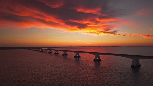 Aerial view of Zeeland Bridge at sunset Netherlands.