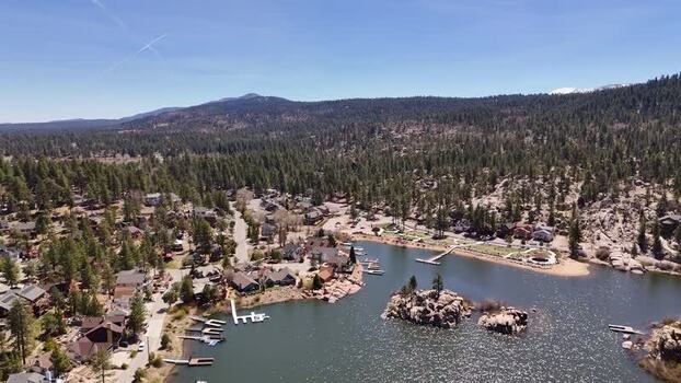Aerial view of Big Bear Lake with houses and pine forests United States. Aerial view of Big Bear Lake with houses and pine forests United States.