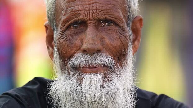 View of an elderly man with a white beard in Bogura Bangladesh. View of an elderly man with a white beard in Bogura Bangladesh.