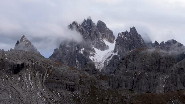 Aerial view of jagged mountain peaks near Rifugio Auronzo Italy.