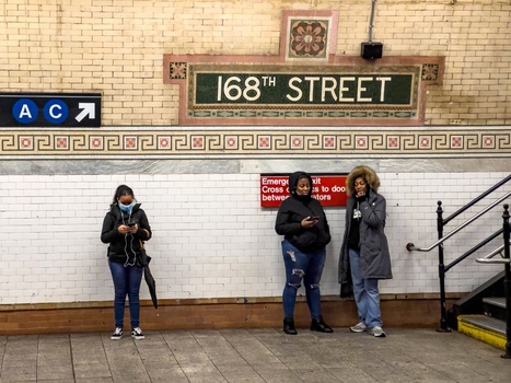 New York City USA 14 May 2026 View of people waiting on the platform at the 168th Street subway station with historic tiled walls and transit signage. New York City USA 14 May 2026 View of people waiting on the platform at the 168th Street subway station with historic tiled walls and transit signage.