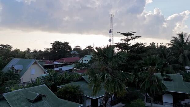 Aerial view of Anse Reunion village with tropical houses Seychelles.