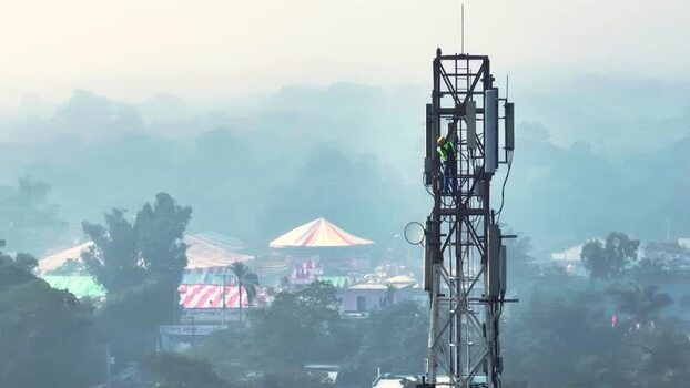 Aerial view of a technician on a telecom tower Bangladesh.