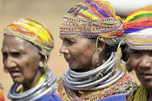 Odisha India 26 March 2026 View of tribal women adorned in vibrant multi colored beaded headdresses and heavy silver necklaces their faces etched with history. Odisha India 26 March 2026 View of tribal women adorned in vibrant multi colored beaded headdresses and heavy silver necklaces their faces etched with history.