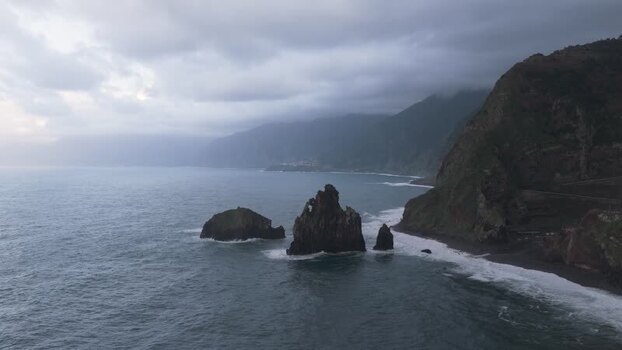 Aerial view of sea stacks and rugged cliffs in Madeira Portugal.