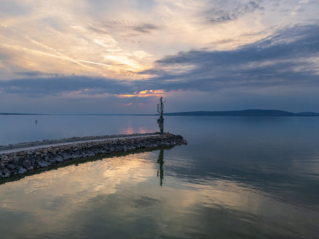 Aerial view of a radio tower near a marine on Lake Balaton at blue hour glow Aerial view of a radio tower near a marine on Lake Balaton at blue hour glow
