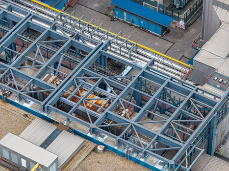 Aerial view of the Heizkraftwerk Reuter West power plant featuring complex steel framework and industrial piping in Berlin Berlin Germany.