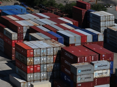 Cincinnati United States 19 April 2026 Aerial view of stacks of colorful shipping containers including Maersk and Crowley brands at a logistics terminal.