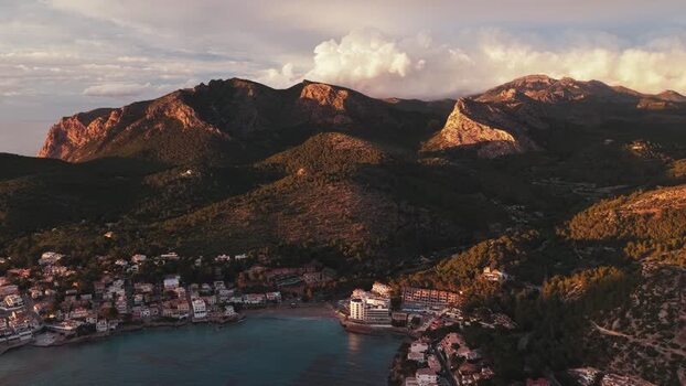 Aerial view of Sant Elm coastal village and mountains Spain.