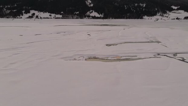 Aerial view of frozen Reschensee in Graun im Vinschgau Italy. Aerial view of frozen Reschensee in Graun im Vinschgau Italy.