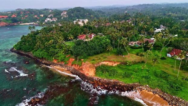 Aerial view of tropical coastal villas in Sri Lanka.