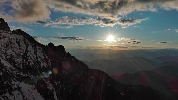 Aerial view of Dolomite Mountains at sunset Italy.