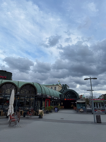 Hanover Germany 29 March 2026 View of the Kropcke area with its distinctive glass roofed pavilion modern street furniture and cloudy sky in the city center.