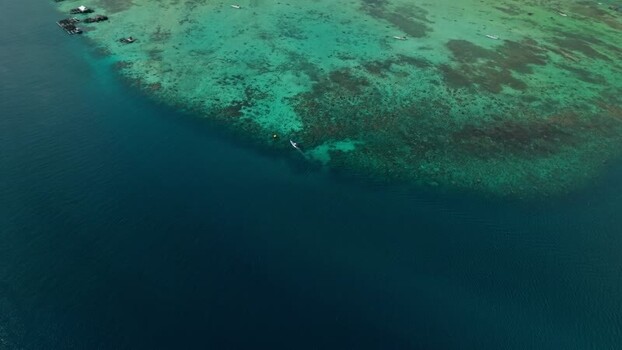 Aerial view of island reefs and boats Indonesia. Aerial view of island reefs and boats Indonesia.