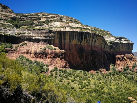 View of the dramatic sandstone cliffs and rugged terrain of Golden Gate Highlands National Park in Clarens Free State South Africa. View of the dramatic sandstone cliffs and rugged terrain of Golden Gate Highlands National Park in Clarens Free State South Africa.
