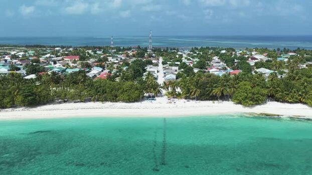 Aerial view of Makunudhoo island and turquoise waters Maldives. Aerial view of Makunudhoo island and turquoise waters Maldives.