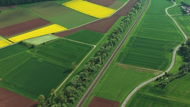 Aerial view of agricultural fields and a railway line Germany.