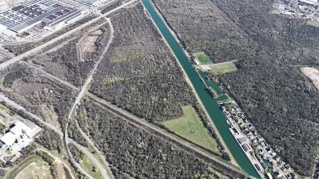 Aerial view of canal and industrial area France.