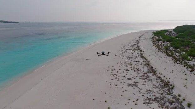 Aerial view of sandy beach and drone Maldives.