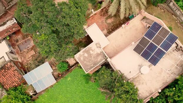 Aerial view of solar panels on a rooftop in Lucknow India.