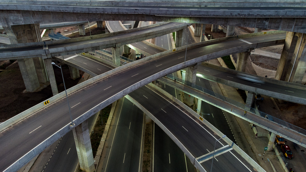Aerial view of the multi level Pokuase Interchange with complex concrete flyovers and road markings in Ga North Municipal Greater Accra Region Ghana. Aerial view of the multi level Pokuase Interchange with complex concrete flyovers and road markings in Ga North Municipal Greater Accra Region Ghana.