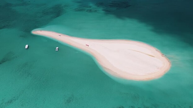 Aerial view of a white sandbank in turquoise waters Maldives. Aerial view of a white sandbank in turquoise waters Maldives.