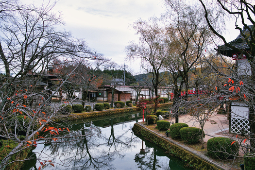 Nikko Japan 02 November 2025 View of Edo Wonderland Nikko Edomura featuring traditional Japanese architecture a tranquil canal and autumn trees. Nikko Japan 02 November 2025 View of Edo Wonderland Nikko Edomura featuring traditional Japanese architecture a tranquil canal and autumn trees.