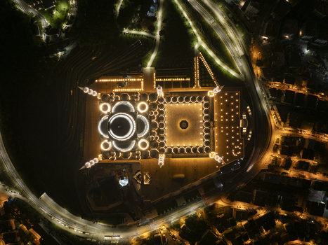 Aerial view of Grand Camlica Mosque illuminated at night with its grand dome and minarets in Uskudar Istanbul Turkiye. Aerial view of Grand Camlica Mosque illuminated at night with its grand dome and minarets in Uskudar Istanbul Turkiye.