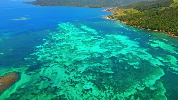 Aerial view of coral reefs and tropical coastline Honduras. Aerial view of coral reefs and tropical coastline Honduras.
