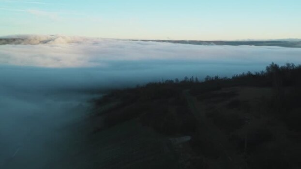 Aerial view of fog over hills France.