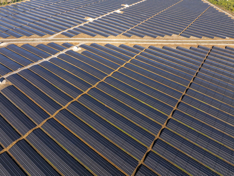 Aerial view of a large solar farm with rows of photovoltaic panels installed on the landscape in Lovech Lovech Bulgaria. Aerial view of a large solar farm with rows of photovoltaic panels installed on the landscape in Lovech Lovech Bulgaria.