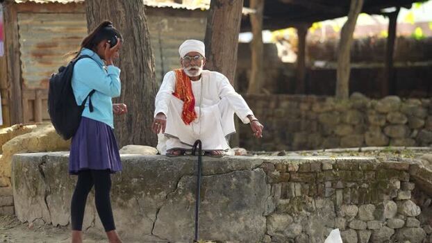 View of an elderly man and a young woman in Dhangadhi Nepal. View of an elderly man and a young woman in Dhangadhi Nepal.