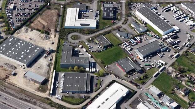 Aerial view of roundabouts and industrial buildings France.